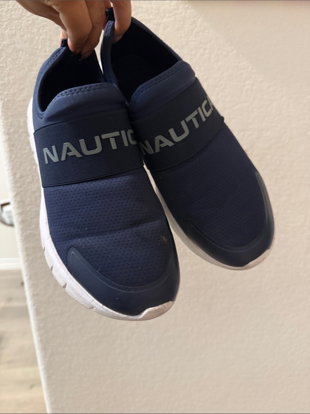 Nautica Men’s Slip-On Sneakers in Navy and White